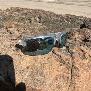 Revo Sunglasses with Clear Frame and Blue Lenses